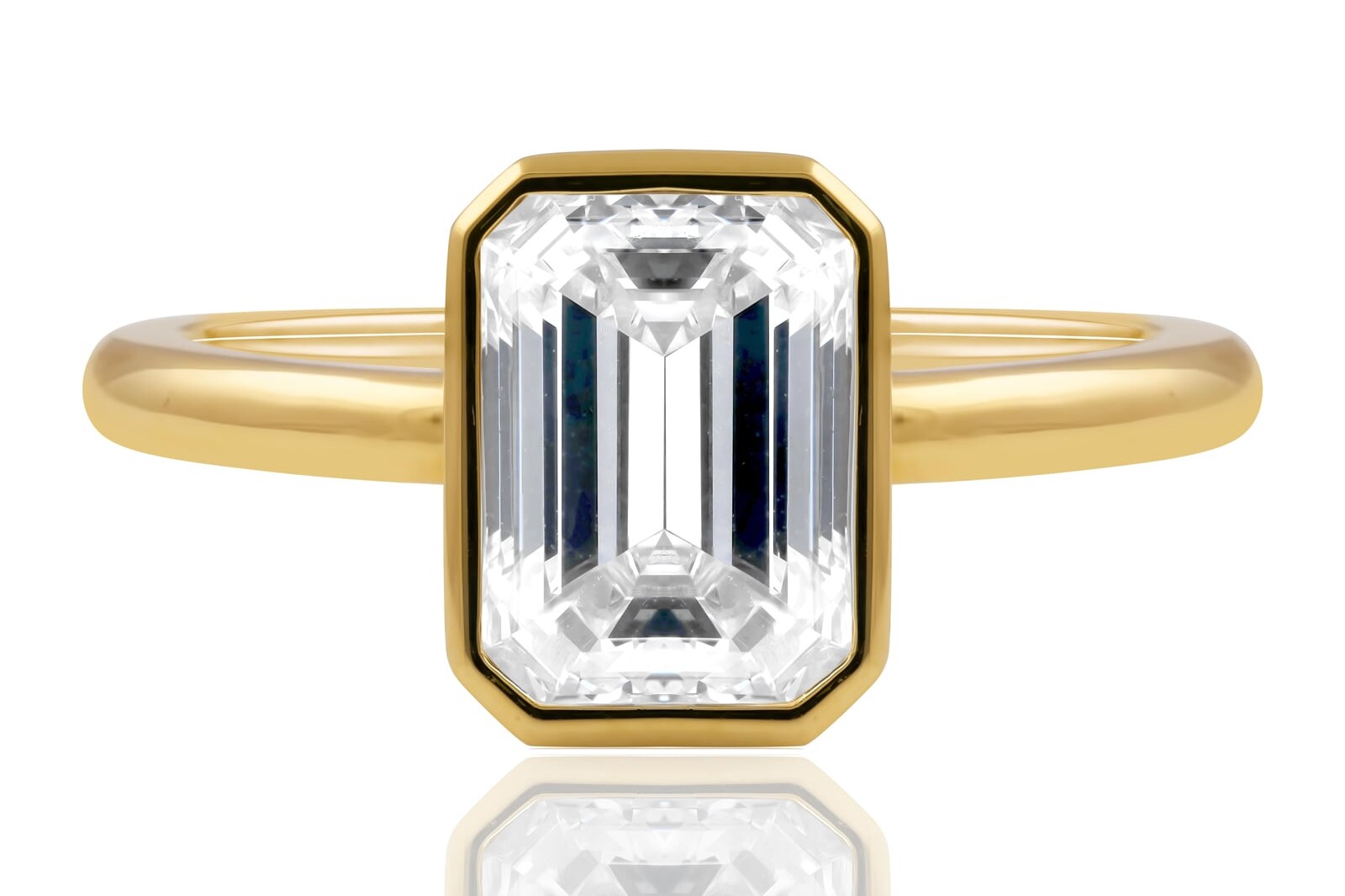 Margot... 2 Carat Emerald Cut Bezel Rubover Solitaire Lab Created Diamond Ring from The Madison Collection.